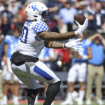 
              Kentucky linebacker Jacquez Jones (10) intercepts a Mississippi pass during the first half of an NCAA college football game in Oxford, Miss., Saturday, Oct. 1, 2022. (AP Photo/Thomas Graning)
            