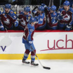 
              Colorado Avalanche center Andrew Cogliano (11) is congratulated for a goal against the Chicago Blackhawks during the first period of an NHL hockey game Wednesday, Oct. 12, 2022, in Denver. (AP Photo/Jack Dempsey)
            