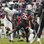 
              Southern University kicker Joshua Griffin (45) has his field goal attempt blocked by Jackson State's defense during the first half of an NCAA college football game in Jackson, Miss., Saturday, Oct. 29, 2022. (AP Photo/Rogelio V. Solis)
            