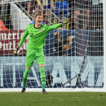
              FILE - United States goalkeeper Ethan Horvath (12) signals against Mexico during the second half of a CONCACAF Nations League championship soccer match, Sunday, June 6, 2021, in Denver.(AP Photo/Jack Dempsey, File)
            