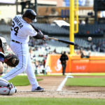 
              Detroit Tigers designated hitter Miguel Cabrera hits a single against the Minnesota Twins during the first inning of a baseball game, Sunday, Oct. 2, 2022, in Detroit. (AP Photo/Jose Juarez)
            