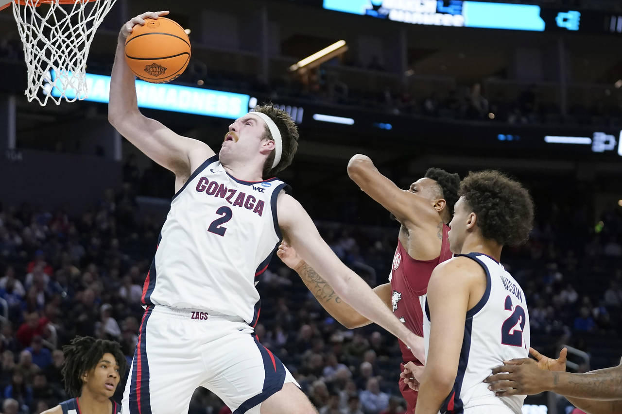 FILE - Gonzaga forward Drew Timme (2) grabs a rebound against Arkansas during the first half of a c...