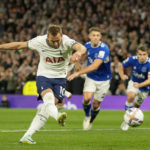 
              Tottenham's Harry Kane scores the opening goal from the penalty spot during the English Premier League soccer match between Tottenham Hotspur and Everton at the Tottenham Hotspur Stadium in London, England, Saturday, Oct. 15, 2022. (AP Photo/Kin Cheung)
            