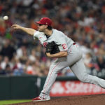 
              Philadelphia Phillies starting pitcher Aaron Nola throws against the Houston Astros during the fifth inning of a baseball game Monday, Oct. 3, 2022, in Houston. (AP Photo/David J. Phillip)
            
