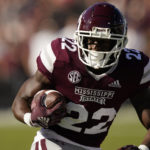 
              Mississippi State running back Simeon Price (22) runs upfield against Texas A&M during the first half of an NCAA college football game in Starkville, Miss., Saturday, Oct. 1, 2022. (AP Photo/Rogelio V. Solis)
            