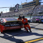 
              Ross Chastain (1) makes a pit stop during a NASCAR Cup Series auto race at Homestead-Miami Speedway, Sunday, Oct. 23, 2022, in Homestead, Fla. (AP Photo/Terry Renna)
            