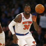 
              New York Knicks forward Julius Randle (30) dribbles up court during the second half of an NBA basketball game against the Orlando Magic, Monday, Oct. 24, 2022, in New York. The Knicks won 115-102. (AP Photo/John Munson)
            