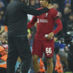 
              Liverpool's manager Jurgen Klopp, left, talks with Liverpool's Trent Alexander-Arnold after substitution during the Champions League Group A soccer match between Liverpool and Rangers at Anfield stadium in Liverpool, England, Tuesday Oct. 4, 2022. (AP Photo/Rui Vieira)
            