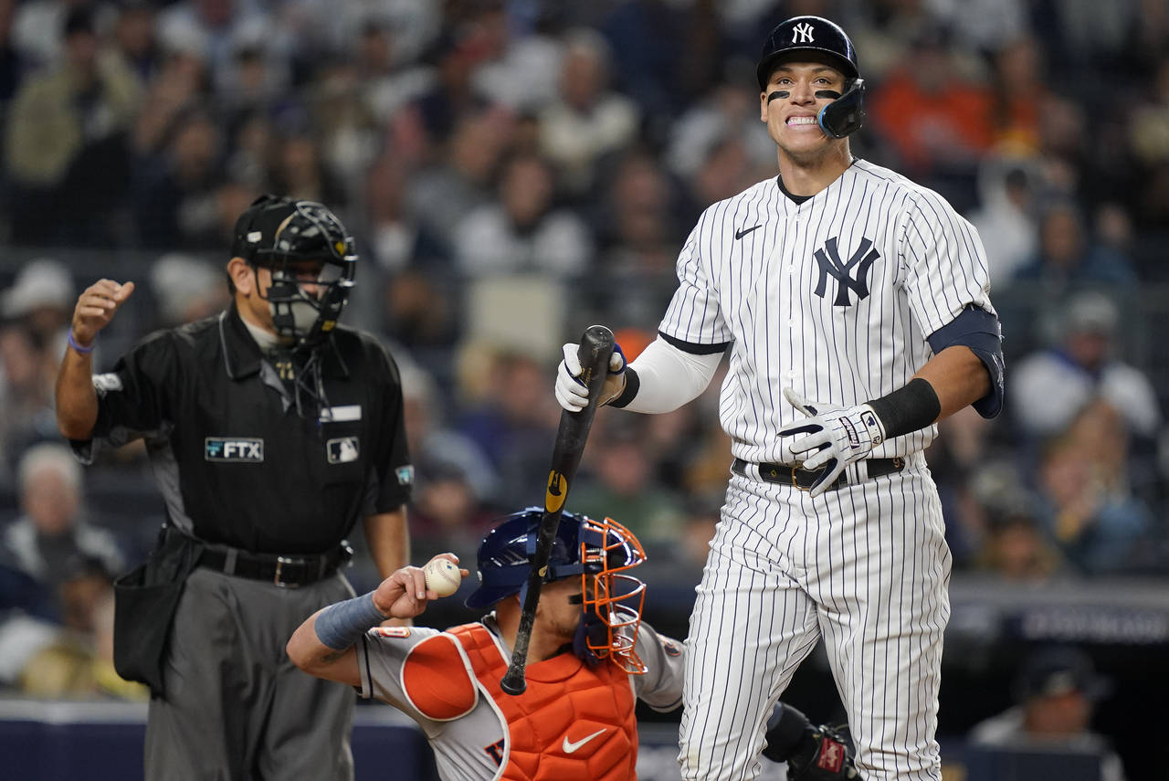 New York Yankees Aaron Judge reacts after striking out against the Houston Astros during the fourth...