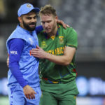
              South Africa's David Miller, right, walks off the field with India's Virat Kohli following the T20 World Cup cricket match between the India and South Africa in Perth, Australia, Sunday, Oct. 30, 2022. South Africa defeated India by wickets. (AP Photo/Gary Day)
            