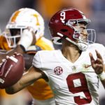 
              Alabama quarterback Bryce Young (9) throws to a receiver during the second half of an NCAA college football game against Tennessee Saturday, Oct. 15, 2022, in Knoxville, Tenn. Tennessee won 52-49. (AP Photo/Wade Payne)
            