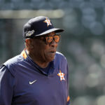 
              Houston Astros manager Dusty Baker Jr. watches during a workout ahead of Game 1 of baseball's American League Division Series, Monday, Oct. 10, 2022, in Houston. The Astros will play the Seattle Mariners Tuesday. (AP Photo/David J. Phillip)
            