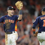 
              Houston Astros third baseman Alex Bregman, left, and Houston Astros first baseman Yuli Gurriel (10) celebrate after Game 2 of baseball's American League Championship Series between the Houston Astros and the New York Yankees, Thursday, Oct. 20, 2022, in Houston. The Houston Astros won 3-2. (AP Photo/Eric Gay)
            