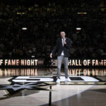 
              Former San Antonio Spurs player and recent Basketball Hall of Fame inductee Manu Ginobili addresses fans during halftime of the Spurs' NBA basketball game against the Charlotte Hornets, Wednesday, Oct. 19, 2022, in San Antonio. (AP Photo/Darren Abate)
            