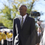 
              Colorado head coach Karl Dorrell arrives with his players at Folsom Field before an NCAA college football game against UCLA Saturday, Sept. 24, 2022, in Boulder, Colo. (AP Photo/David Zalubowski)
            