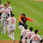 
              The Baltimore Orioles celebrate after a baseball game against the New York Yankees, Sunday, Oct. 2, 2022, in New York. The Orioles won 3-1. (AP Photo/Frank Franklin II)
            