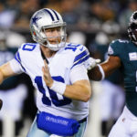 
              Dallas Cowboys' Cooper Rush looks to pass during the second half of an NFL football game against the Philadelphia Eagles on Sunday, Oct. 16, 2022, in Philadelphia. (AP Photo/Chris Szagola)
            