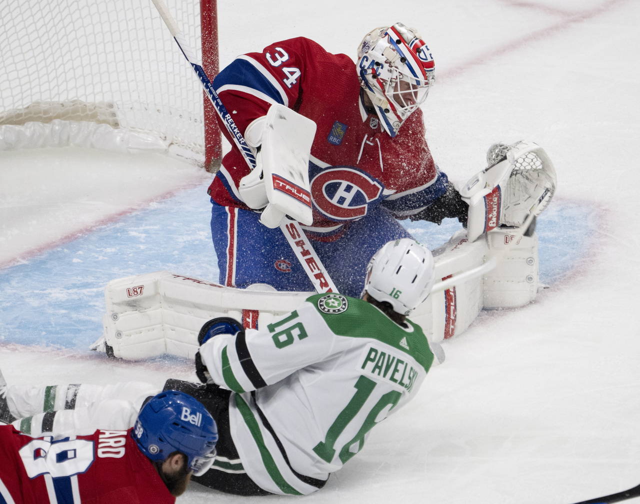 Montreal Canadiens goaltender Jake Allen (34) stops Dallas Stars' Joe Pavelski (16) during second-p...