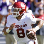 
              Oklahoma quarterback Dillon Gabriel (8) looks to throw against TCU during the first half of an NCAA college football game Saturday, Oct. 1, 2022, in Fort Worth, Texas. (AP Photo/Ron Jenkins)
            