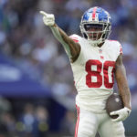 
              New York Giants wide receiver Richie James (80) gestures during the second quarter of an NFL game between the New York Giants and the Green Bay Packers at the Tottenham Hotspur stadium in London, Sunday, Oct. 9, 2022. (AP Photo/Kin Cheung)
            
