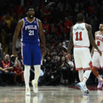 
              Philadelphia 76ers center Joel Embiid (21) reacts after scoring a three point basket to give his team the lead in the second half of an NBA basketball game against the Chicago Bulls, Saturday, Oct. 29, 2022, in Chicago. (AP Photo/Matt Marton)
            