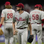 
              Philadelphia Phillies starting pitcher Aaron Nola leaves the game during the fifth inning in Game 1 of baseball's World Series between the Houston Astros and the Philadelphia Phillies on Friday, Oct. 28, 2022, in Houston. (AP Photo/Eric Gay)
            