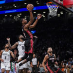 
              Miami Heat forward Jamal Cain (8) scores against the Brooklyn Nets during the second half of a preseason NBA basketball game, Thursday, Oct. 6, 2022, in New York. (AP Photo/Eduardo Munoz Alvarez)
            