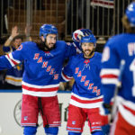 
              New York Rangers defenseman center Mika Zibanejad, left, and center Vincent Trocheck celebrate Trocheck's goal during the first period of an NHL hockey game against the Anaheim Ducks, Monday, Oct. 17, 2022, in New York. (AP Photo/Julia Nikhinson)
            