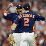 
              Houston Astros Alex Bregman (2) and Houston Astros Yuli Gurriel celebrate after Game 2 of baseball's American League Championship Series between the Houston Astros and the New York Yankees, Thursday, Oct. 20, 2022, in Houston. The Houston Astros won 3-2. (AP Photo/Eric Gay)
            