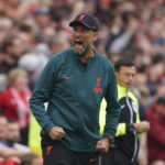 
              Liverpool manager Jurgen Klopp celebrates after Roberto Firmino scored his side's first goal during the English Premier League soccer match between Liverpool and Brighton & Hove Albion at Anfield, Liverpool, England, Saturday Oct. 1, 2022. (Peter Byrne/PA via AP)
            