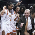 
              FILE - Texas head coach Vic Schaefer reacts as he huddles with his team after a college basketball game in the Sweet 16 round of the NCAA tournament, Friday, March 25, 2022, in Spokane, Wash. Texas won 66-63. Texas is ranked No. 3 in The Associated Press Top 25 women's preseason basketball poll released Tuesday, Oct. 18, 2022.(AP Photo/Ted S. Warren, File)
            