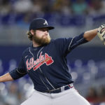 
              Atlanta Braves' Bryce Elder delivers a pitch during the first inning of a baseball game against the Miami Marlins, Monday, Oct. 3, 2022, in Miami. (AP Photo/Wilfredo Lee)
            