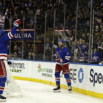 
              New York Rangers center Barclay Goodrow, right, celebrate scoring a goal with Jacob Trouba (8) against the Colorado Avalanche in the second period of an NHL hockey game Tuesday, Oct. 25, 2022, in New York. (AP Photo/Adam Hunger)
            