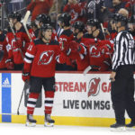
              New Jersey Devils center Dawson Mercer (91) celebrates after scoring a goal against the San Jose Sharks during the second period of an NHL hockey game, Saturday, Oct. 22, 2022 in Newark, N.J. (AP Photo/Noah K. Murray)
            