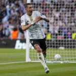 
              FILE - Argentina's Angel Di Maria celebrates after scoring his side's second goal during the Finalissima soccer match between Italy and Argentina at Wembley Stadium in London , Wednesday, June 1, 2022. (AP Photo/Matt Dunham, File)
            