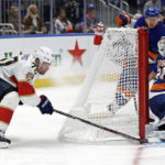 
              Florida Panthers right wing Patric Hornqvist (70) scores a goal past New York Islanders goaltender Ilya Sorokin during the third period of an NHL hockey game Thursday, Oct. 13, 2022, in Elmont, N.Y. (AP Photo/Adam Hunger)
            