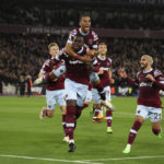 
              West Ham's Kurt Zouma, center, celebrates with teammates after scoring his sides first goal during the English Premier League soccer match between West Ham United and Bournemouth at the London Stadium in London, England, Monday, Oct. 24, 2022. (AP Photo/Ian Walton)
            