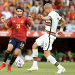 
              FILE - Spain's Carlos Soler vies for the ball with Portugal's Pepe, right, during the UEFA Nations League soccer match between Spain and Portugal, at the Benito Villamarin Stadium, in Seville, Spain, Thursday, June 2, 2022. (AP Photo/Jose Breton, File)
            