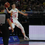
              China's Jin Weina attempts to keep the ball in play during their gold medal game at the women's Basketball World Cup against the United States in Sydney, Australia, Saturday, Oct. 1, 2022. (AP Photo/Mark Baker)
            