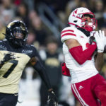 
              Nebraska wide receiver Trey Palmer (3) makes a catch in front of Purdue cornerback Jamari Brown (7) during the first half of an NCAA college football game in West Lafayette, Ind., Saturday, Oct. 15, 2022. (AP Photo/Michael Conroy)
            