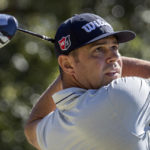 
              Gary Woodland watches his drive down the 12th fairway during the first round of the CJ Cup golf tournament Thursday, Oct. 20, 2022, in Ridgeland, S.C. (AP Photo/Stephen B. Morton)
            