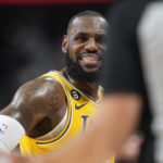 
              Los Angeles Lakers forward LeBron James argues for a call with a referee in the second half of an NBA basketball game against the Denver Nuggets Wednesday, Oct. 26, 2022, in Denver. (AP Photo/David Zalubowski)
            