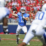 
              Mississippi quarterback Jaxson Dart (2) looks to pass during the second half of an NCAA college football game against Kentucky in Oxford, Miss., Saturday, Oct. 1, 2022. Mississippi won 22-19. (AP Photo/Thomas Graning)
            