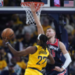 
              Indiana Pacers' Isaiah Jackson (22) shoots against Washington Wizards' Kristaps Porzingis during the first half of an NBA basketball game Wednesday, Oct. 19, 2022, in Indianapolis. (AP Photo/Michael Conroy)
            