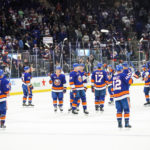
              New York Islanders players celebrate after defeating the Colorado Avalanche in an NHL hockey game, Saturday, Oct. 29, 2022, in Elmont, N.Y. (AP Photo/Eduardo Munoz Alvarez)
            