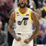 
              Utah Jazz guard Nickeil Alexander-Walker (6) reacts during the first half of an NBA basketball game against the Memphis Grizzlies Saturday, Oct. 29, 2022, in Salt Lake City. (AP Photo/Rick Bowmer)
            