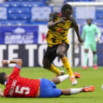
              FILE - Ghana's Felix Ohene Afena-Gyan top, is tackled by Chile's Paulo Diaz during the match between Ghana and Chile at the Kirin Cup soccer tournament in Suita, west Japan, Tuesday, June 14, 2022. (AP Photo/Eugene Hoshiko, File)
            