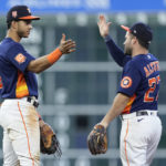 
              Houston Astros shortstop Jeremy Pena, left, and second baseman Jose Altuve, right, celebrate after a baseball game against the Tampa Bay Rays, Sunday, Oct. 2, 2022, in Houston. (AP Photo/Kevin M. Cox)
            