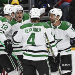 
              Dallas Stars left wing Mason Marchment, second from left, celebrates with teammates after scoring a goal against the Nashville Predators during the first period of an NHL hockey game Thursday, Oct. 13, 2022, in Nashville, Tenn. (AP Photo/Mark Zaleski)
            