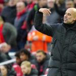 
              Manchester City's head coach Pep Guardiola reacts during the English Premier League soccer match between Liverpool and Manchester City at Anfield stadium in Liverpool, Sunday, Oct. 16, 2022. (AP Photo/Jon Super)
            